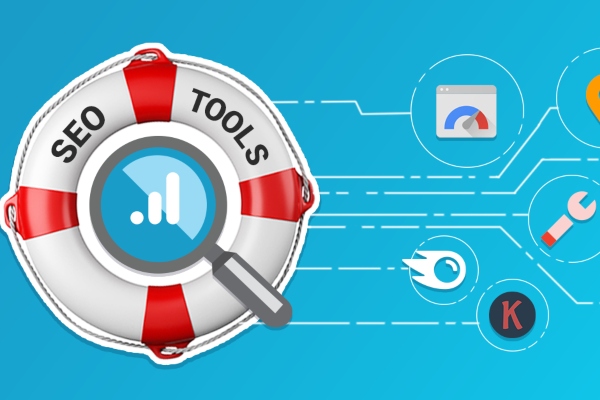 Working on laptops with SEO tools icons floating